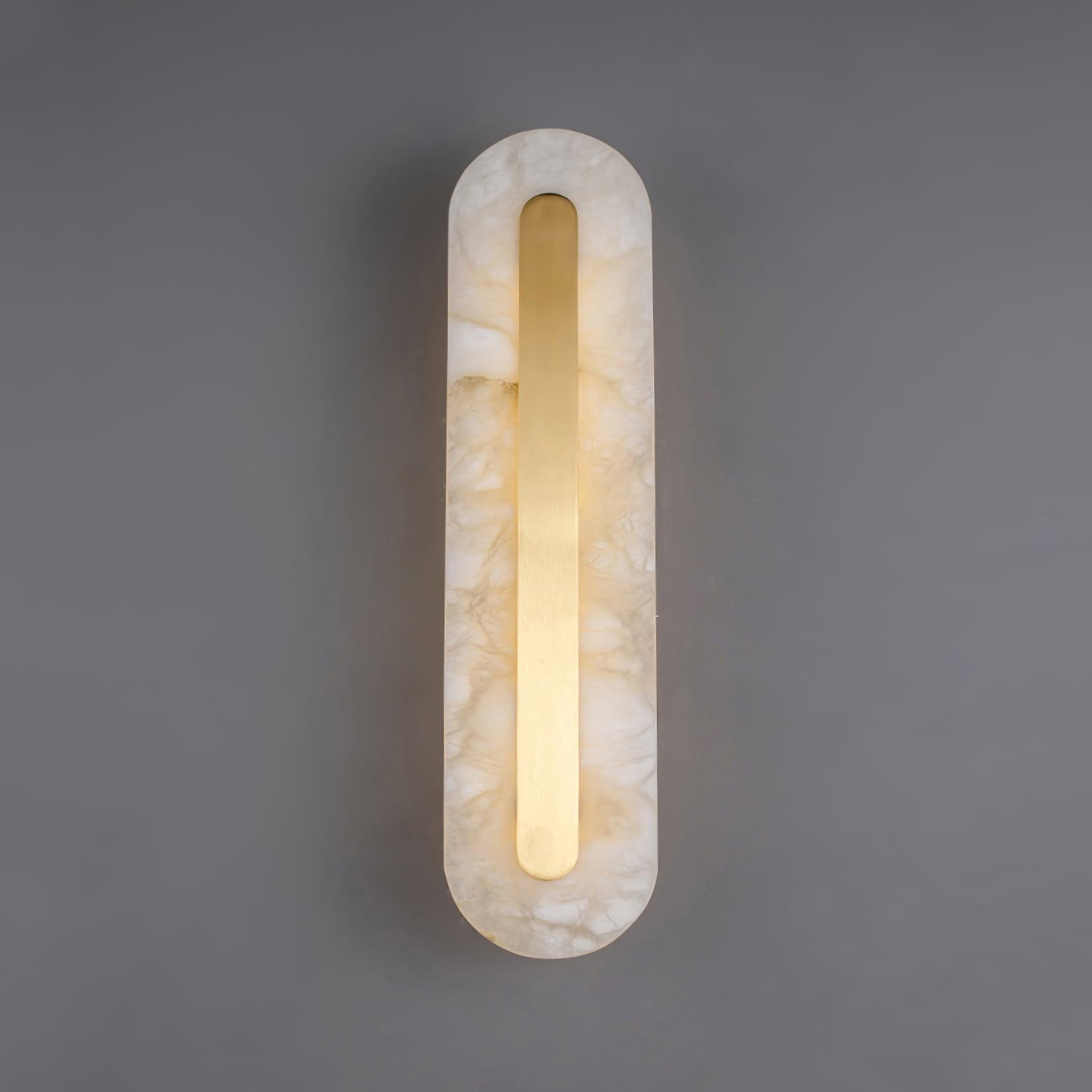 Clérachic Kristy wall lamp on grey with heavier veining running through the alabaster.
