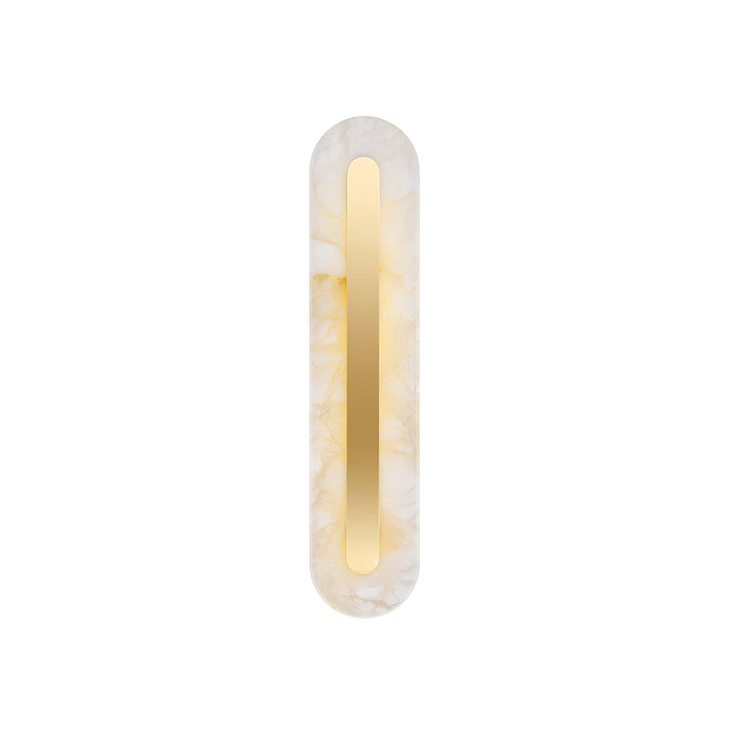 The Clérachic Kristy wall lamp on white, lit, showing the slim oval and brass line.