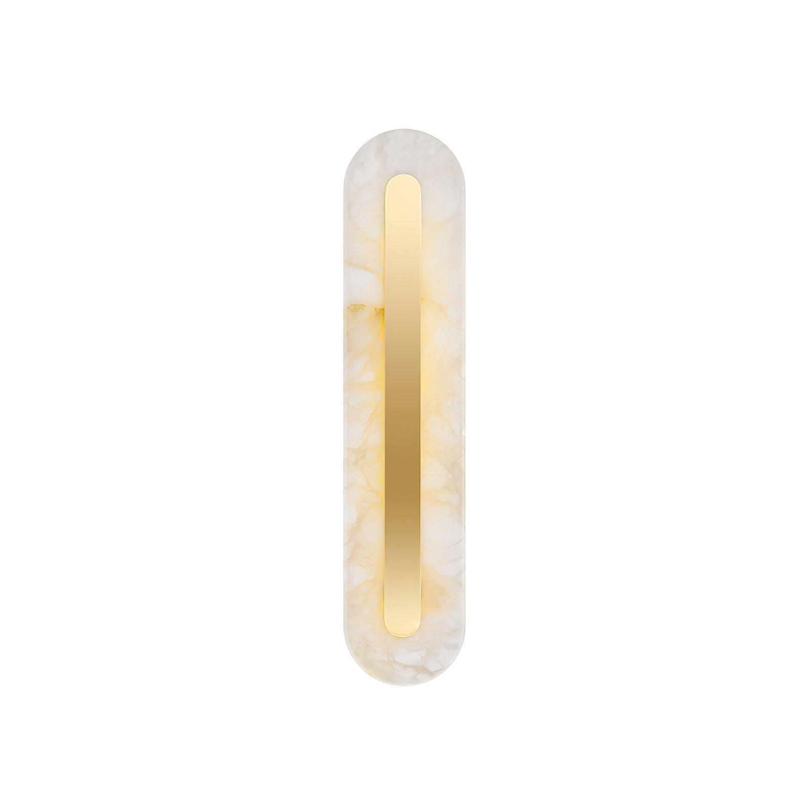 The Clérachic Kristy wall lamp on white, lit, showing the slim oval and brass line.