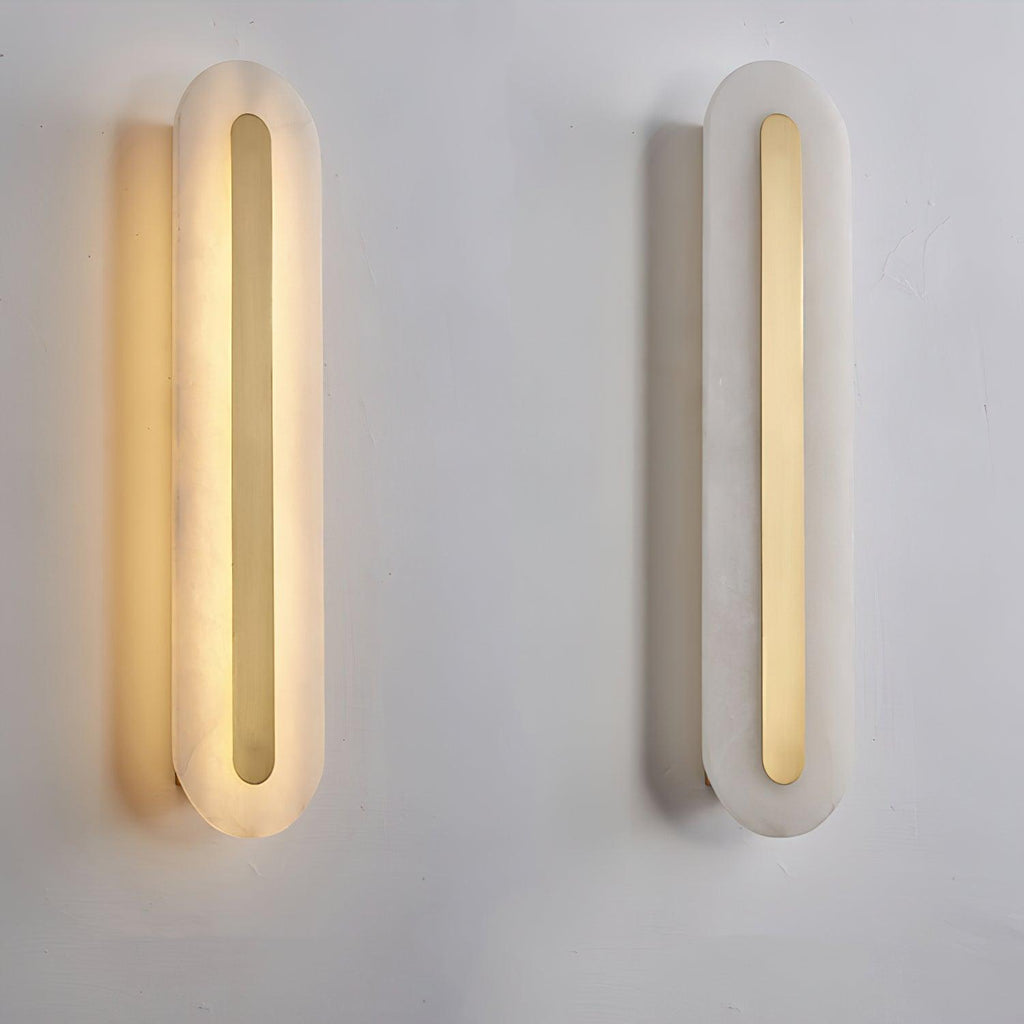 Two Clérachic Kristy wall lamps on plaster, the left lit and the right switched off.