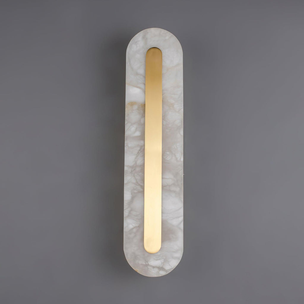 Clérachic Kristy wall lamp on grey, warm veining showing through the lit alabaster.