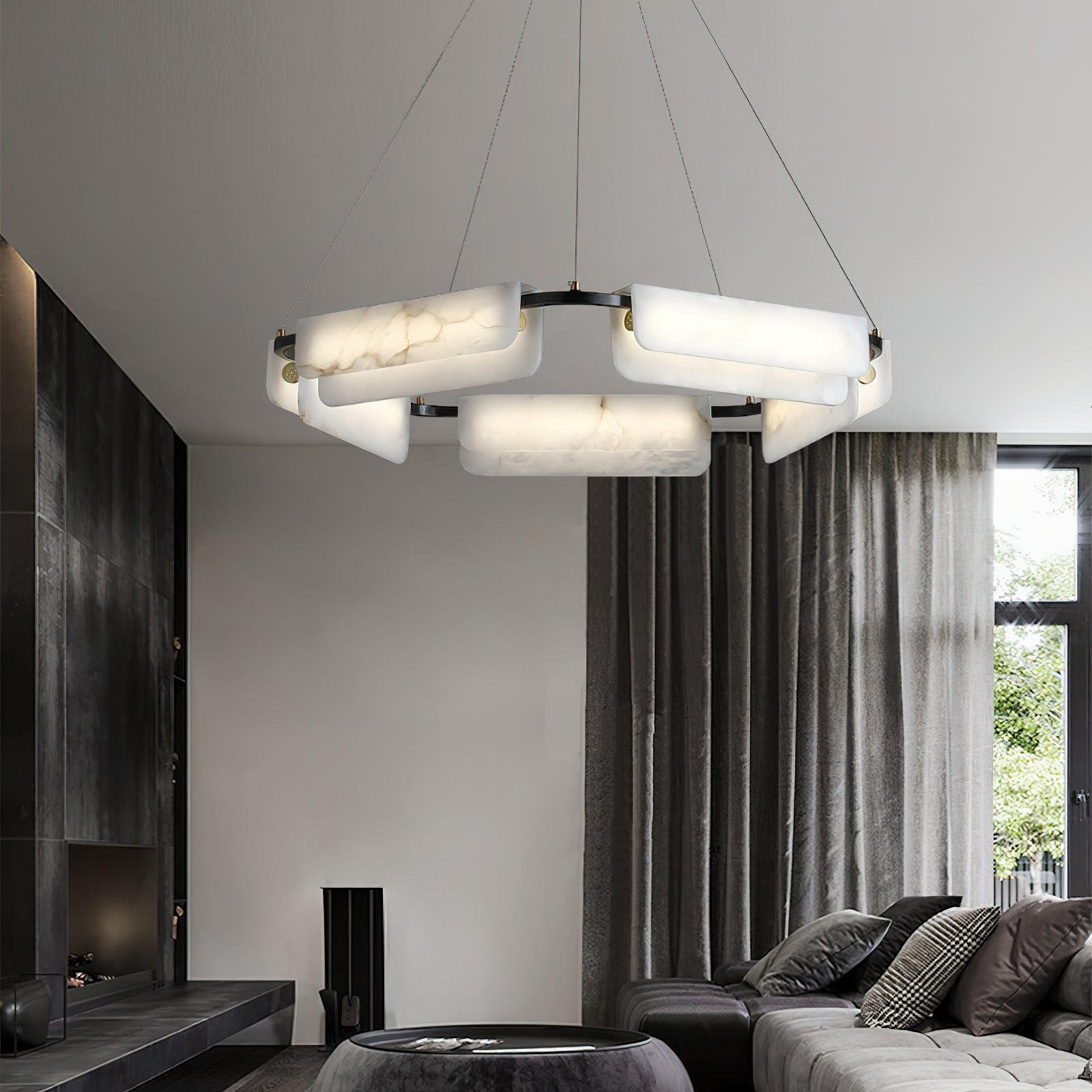 Clérachic Layered Alabaster Plate Chandelier seen from below in a fireplace lounge, its ring floating under a white ceiling.