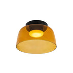 A single-layer orange glass Clérachic ceiling light with a deep bowl shape and a glowing disc, on a white backdrop.