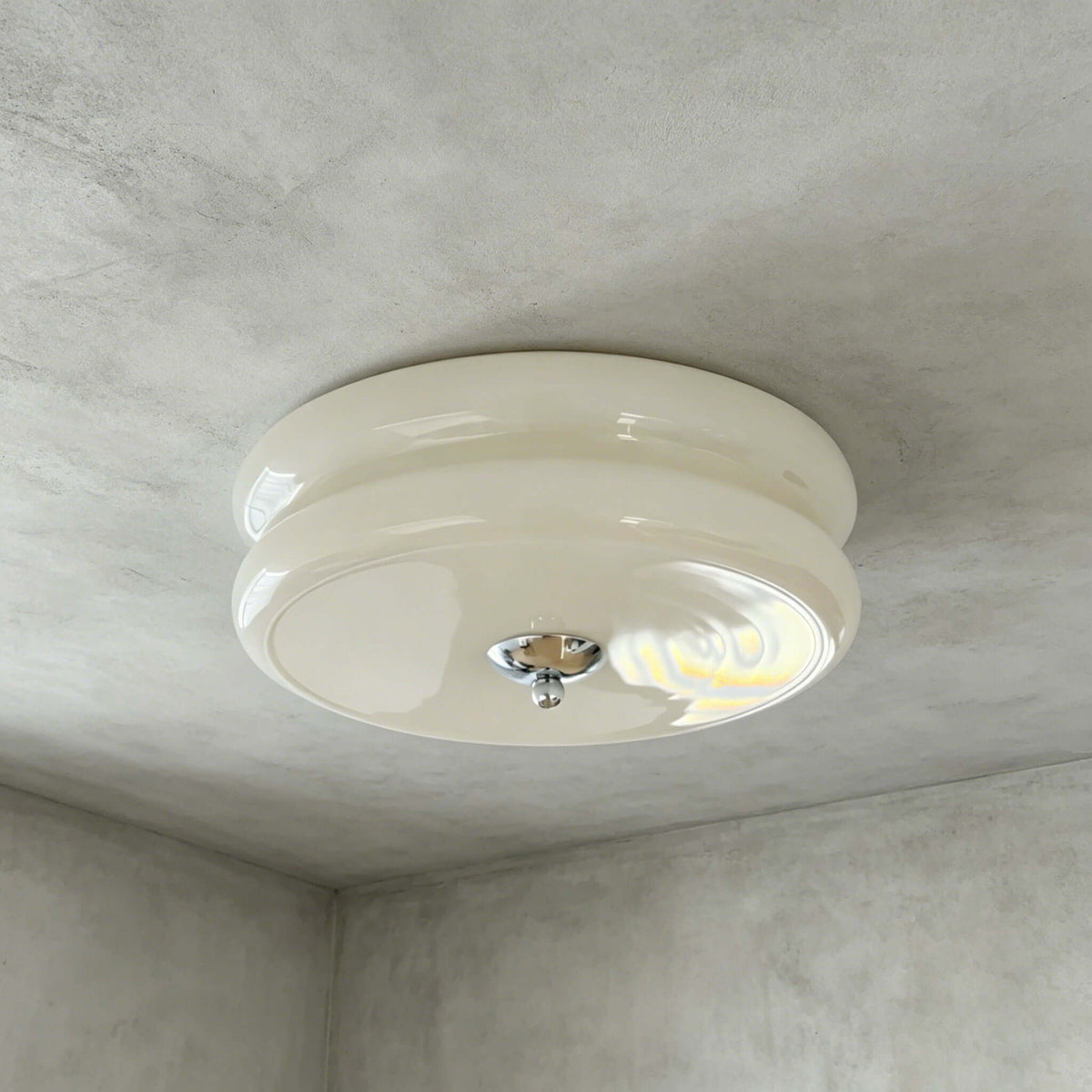 The beige and chrome version of this Clérachic flush mount, with a polished chrome finial under a layered cream glass shade.