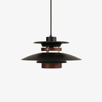Black layered Clérachic pendant with a dark oak wood band and a wood-toned lower cylinder, on a plain white backdrop.