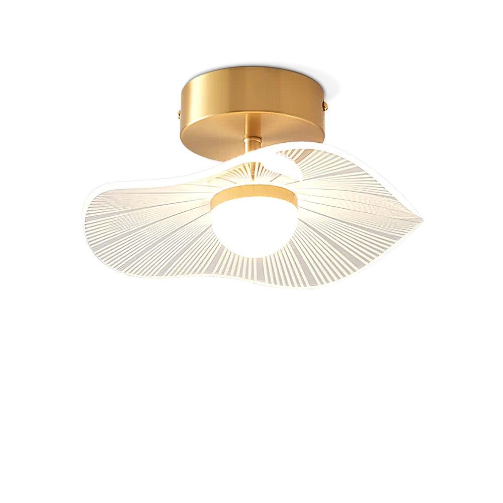 Brass-fitted ceiling light with a leaf-edged clear acrylic shade and a glowing opal globe, on white, a Clérachic ceiling light.