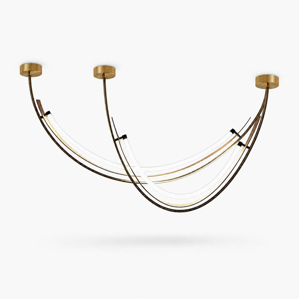 Three-point arc ceiling light from Clérachic, with brass canopies and black frame arcs holding white light strips, on a white background.
