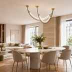 Clérachic arc pendant above a large oval table, in an open living and dining room with a Parisian street outside the windows.