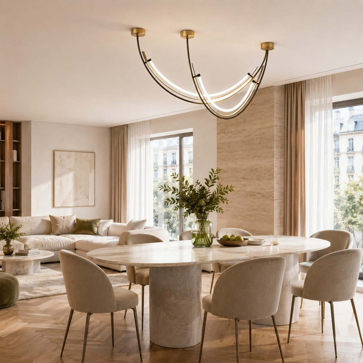 Clérachic arc pendant above a large oval table, in an open living and dining room with a Parisian street outside the windows.