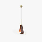 Studio view of the Clérachic Leather Pendant Light: gold canopy, brown leather loop, white boat-shaped diffuser.