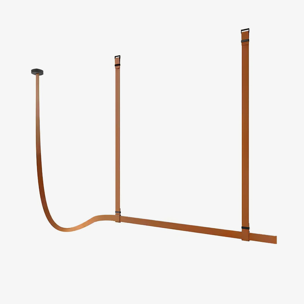 Tan leather strap light on a plain white backdrop, with two straps dropping from the ceiling and a long strap curving into a horizontal bar, from Clérachic.