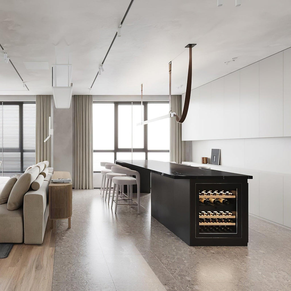 Brown strap pendant seen far back in an open-plan kitchen and living room with a black island, from Clérachic.