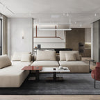 Terracotta strap pendant over a kitchen in a calm living space with a cream sofa and low tables, a Clérachic lamp.