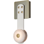 Angled view of the Clérachic Leather Strap Wall Sconce, white leather and a brass plate standing clear of the wall.