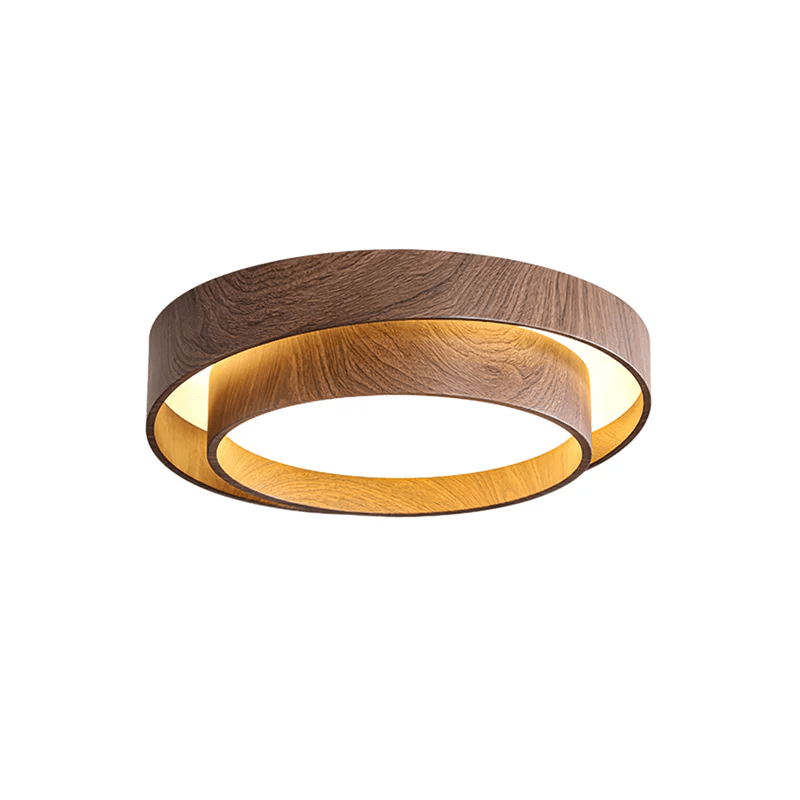 Smaller Clérachic ceiling light on a white backdrop, lit, with a warm glow in the lower ring beneath the outer wood-grain ring.