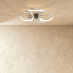 Clérachic ceiling fan with a light in white: interlocking looped LED bands around a central fan, seen in a studio.