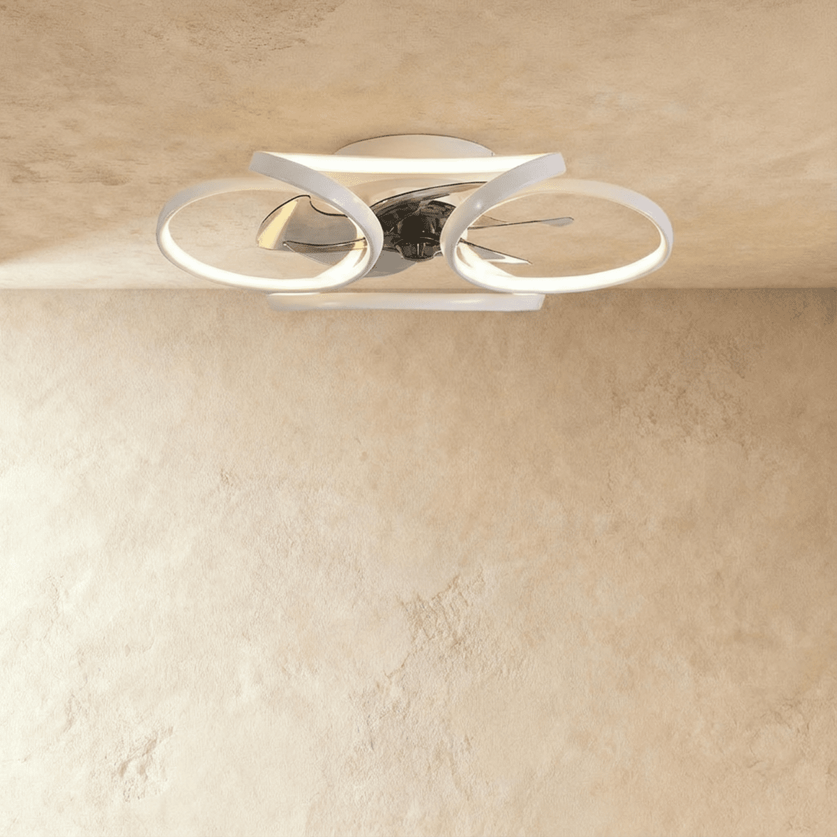 Clérachic larger white ceiling fan with a light in studio view, its looped LED bands wide around the central fan blades.