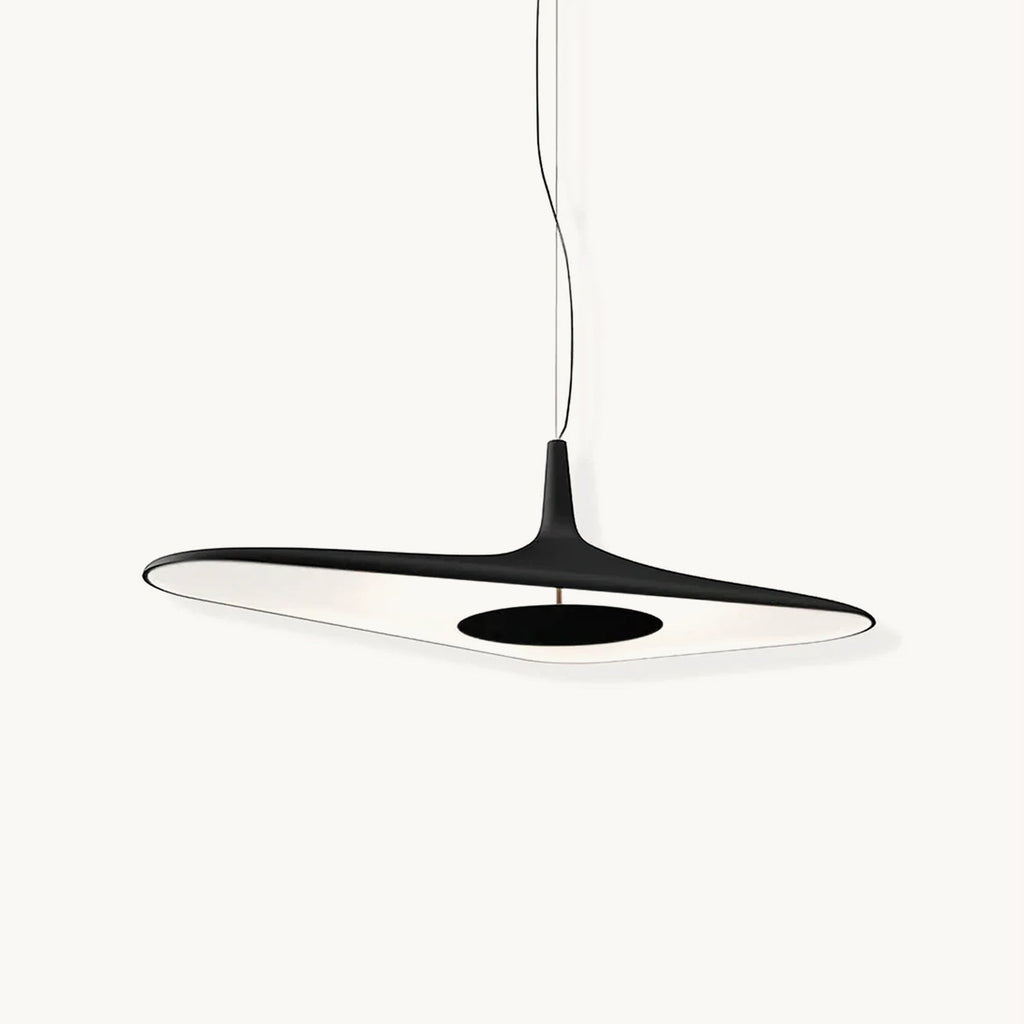 A black flat disc pendant with a white inner surface and a dark central plate hangs on a thin cable against a plain white backdrop, this Clérachic LED pendant.