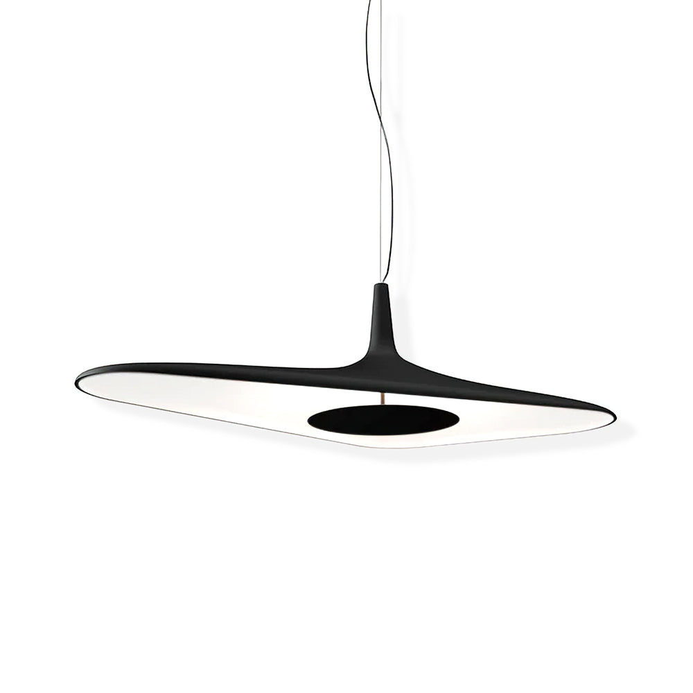 A black disc pendant with a white underside and a round dark centre plate hangs on its cable against a plain white backdrop, from Clérachic.