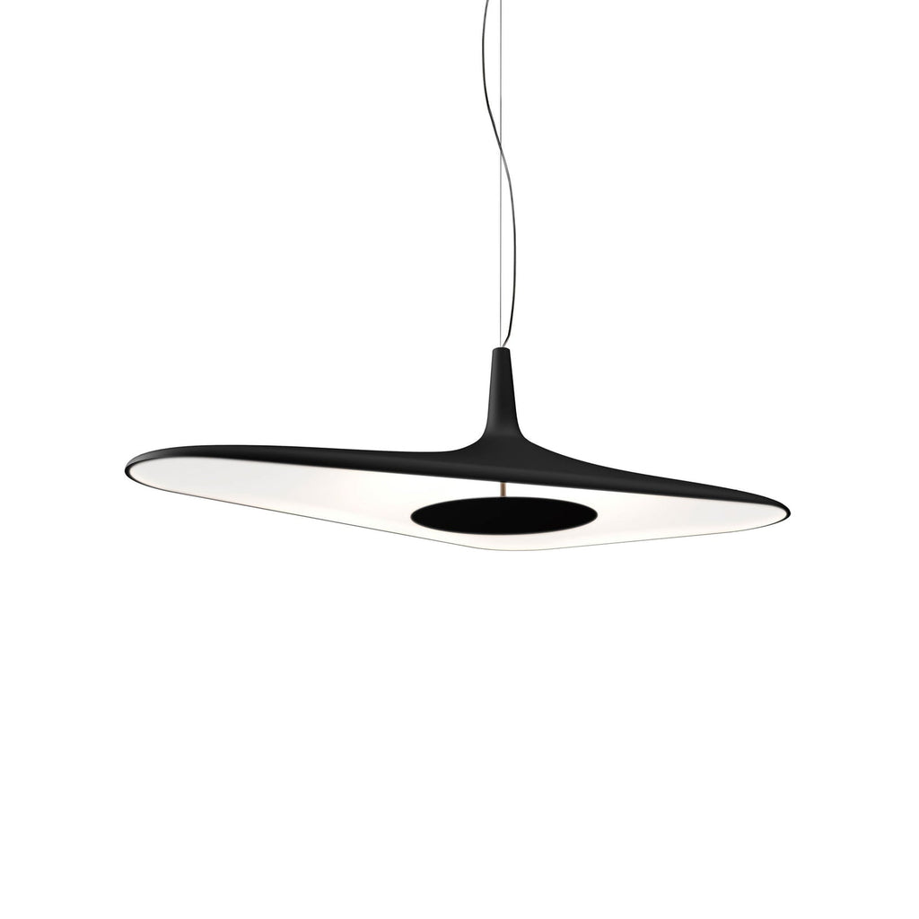 A black disc pendant with a white inner surface hangs on a thin cable against a plain white backdrop, from Clérachic.