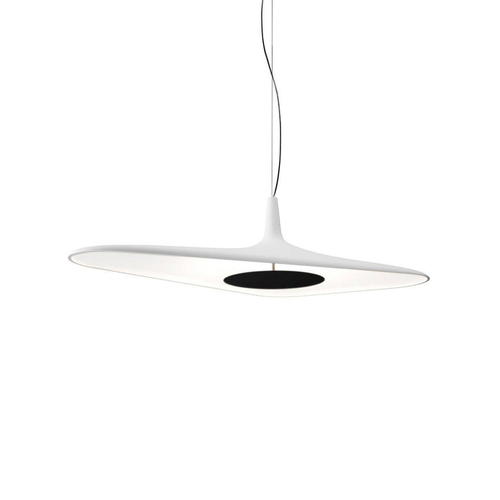 A white disc pendant with a black centre plate hangs on a thin cable against a plain white backdrop, from Clérachic.