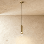 Clérachic single gold brass-tone cylinder pendant with a clear glass tip, hanging from a small round gold ceiling plate.