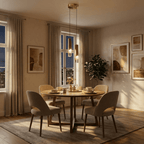Clérachic two-head gold cylinder pendant glowing warmly over a round dining table at dusk, city lights in the window.