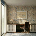 Clérachic recessed downlights in a ceiling above a desk with a pleated table lamp, a framed fish print and a brown leather chair.