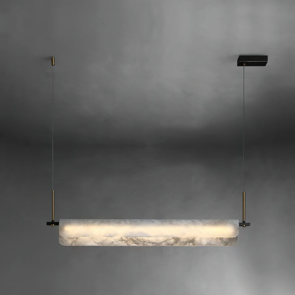 Clérachic Linear Alabaster LED Pendant Light on a soft grey studio backdrop, the full bar lit and hung level from its black driver box.