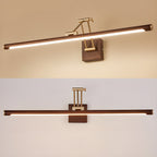 Two views of this Clérachic linear wall light, lit against a warm beige wall above and unlit on a pale wall below.