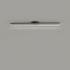 Clérachic single black bar ceiling light with a slim glowing frosted diffuser and a small round canopy, on a grey ceiling.
