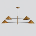Clérachic four-light chandelier in brushed brass and black, front view of the two tiers of cone shades on long arms