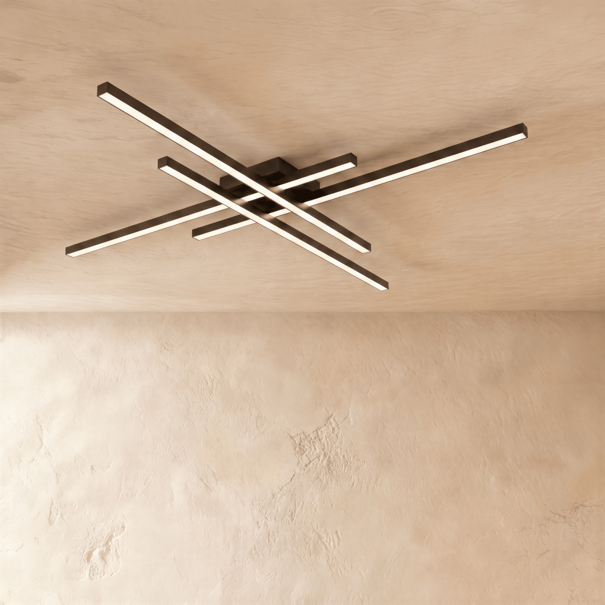 Clérachic black crossed-bar LED ceiling light in a long size, four glowing bars fixed flush to a limewash ceiling.