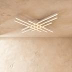 Clérachic white six-bar LED ceiling light, layered crossed aluminium bars with frosted diffusers glowing on limewash.