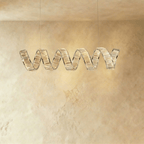 Clérachic single-wave spiral chandelier in chrome, a ribbon of clear crystal blocks hung from two fine cables.