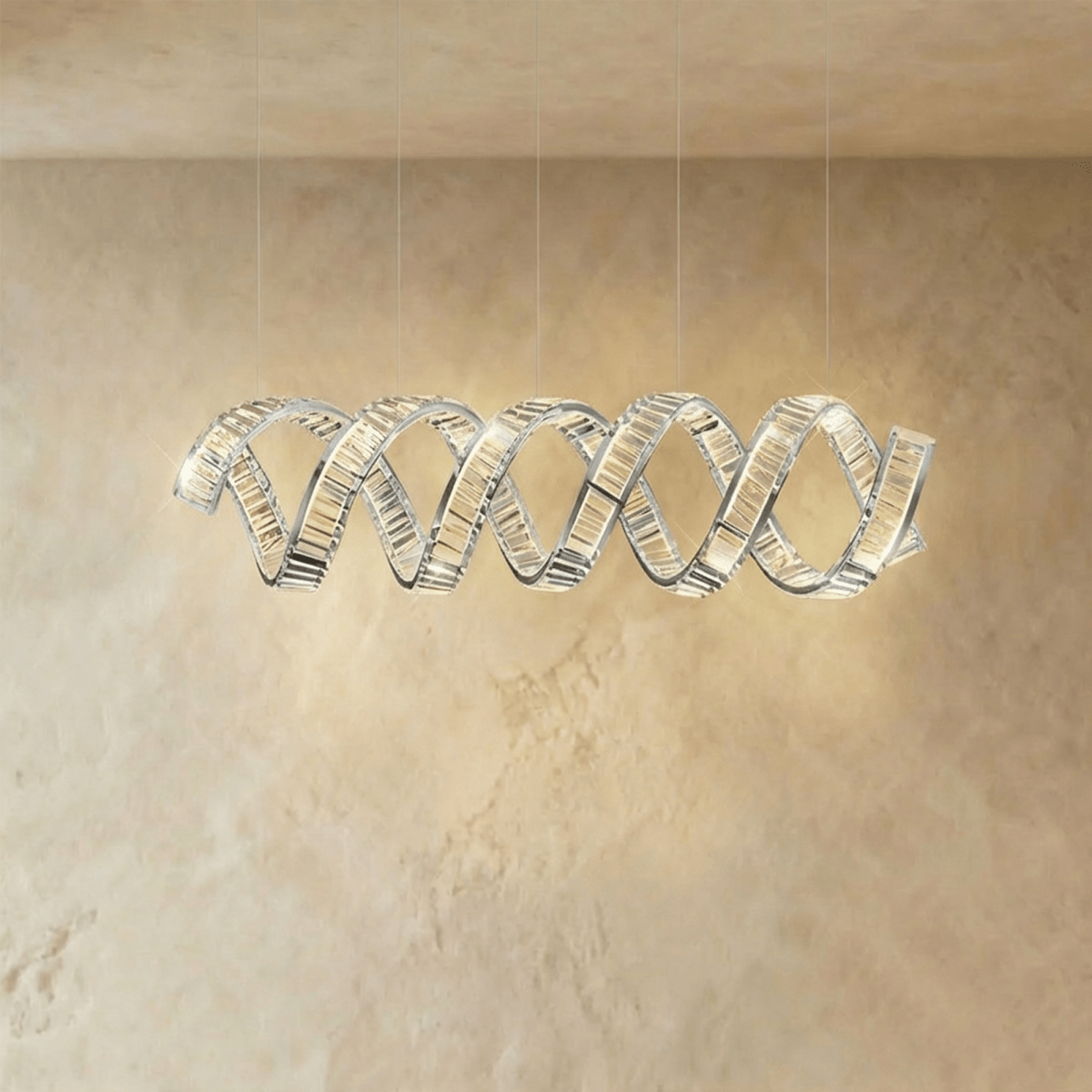 Clérachic double-wave spiral chandelier in chrome, two intertwined crystal ribbons on five fine cables.