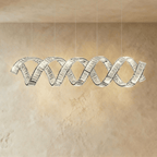 Clérachic widest double-wave spiral chandelier in chrome, twin crystal ribbons sparkling on five fine cables.