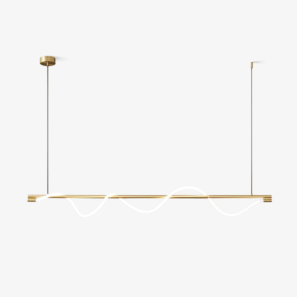 Brass Clérachic linear pendant with a white silicone line looping along the bar, on a plain white backdrop.