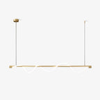 Brass Clérachic linear pendant with a white silicone line looping along the bar, on a plain white backdrop.