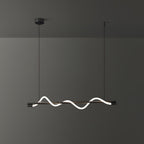 Black Clérachic linear pendant with a glowing white wave, on a black canopy against a dark grey wall.