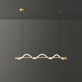 Clérachic linear pendant with a brass bar and three small glowing waves, against a charcoal wall.