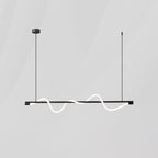 Black Clérachic linear pendant with a shallow glowing wave, on a pale grey backdrop.