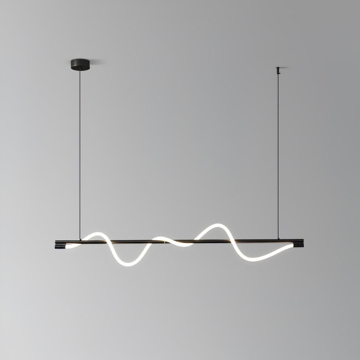 Clérachic black linear pendant with a glowing wave on a graduated grey backdrop.