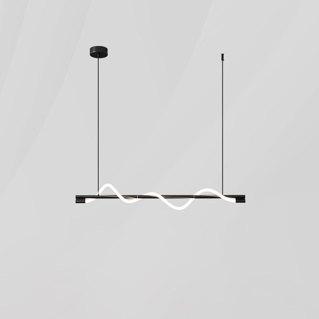 A compact black Clérachic linear pendant with a glowing wave, centred on a light grey backdrop.