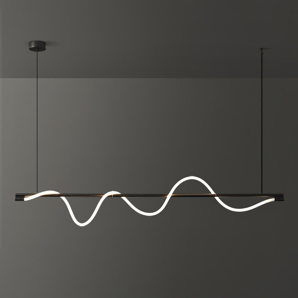 Close-cropped black Clérachic linear pendant with a tall glowing wave, against a dark wall.