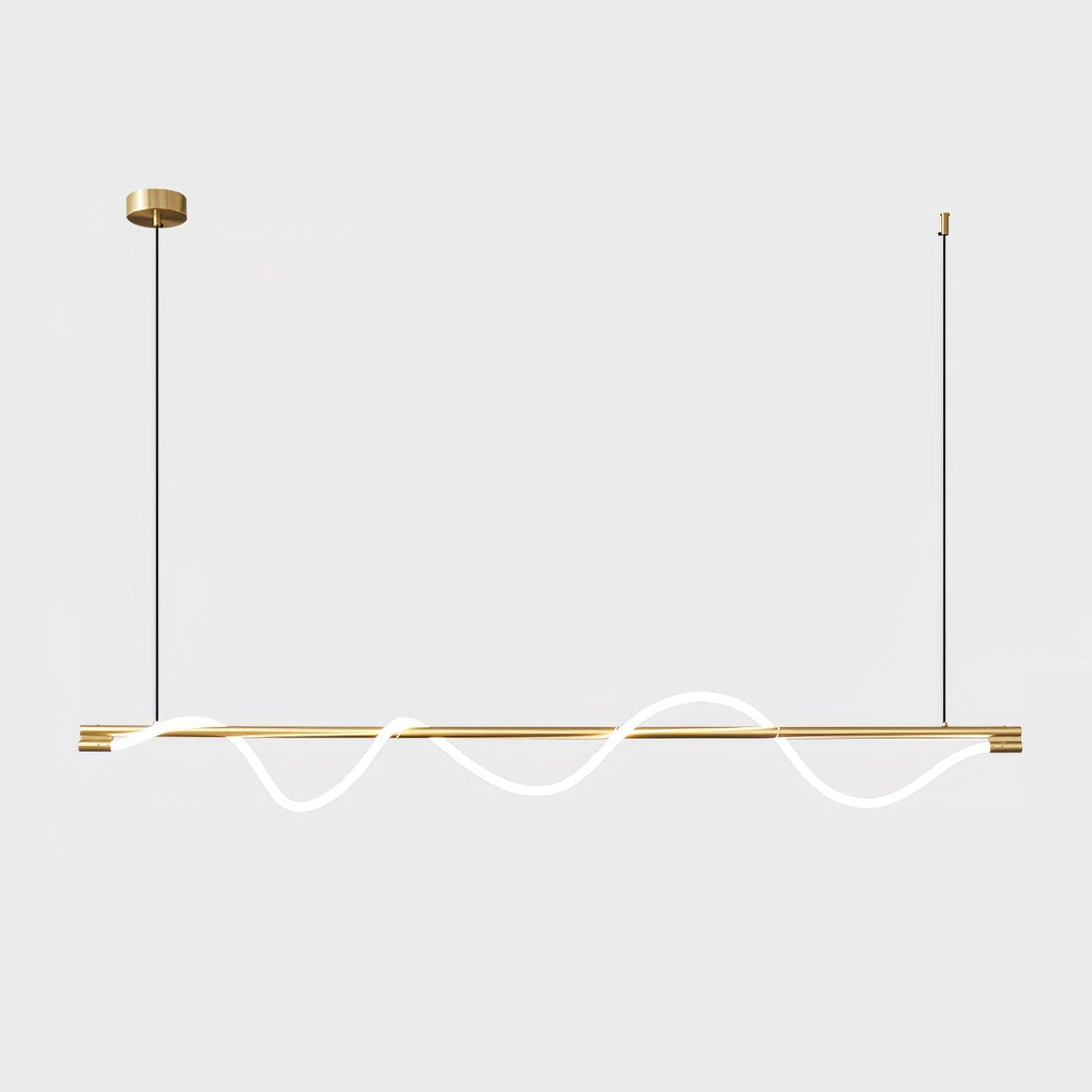 Brass Clérachic linear pendant with a glowing wave, a brass canopy and thin cords, on an off-white backdrop.