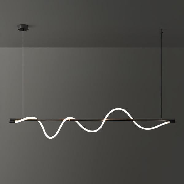 Wide view of a black Clérachic linear pendant with a bright, deep wave, in front of a dark grey wall.