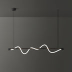 Black Clérachic linear pendant with a tilted glowing wave, seen slightly from the side against a dark wall.