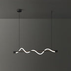 Clérachic black linear pendant angled slightly, with a glowing wave and a black canopy, on a dark wall.