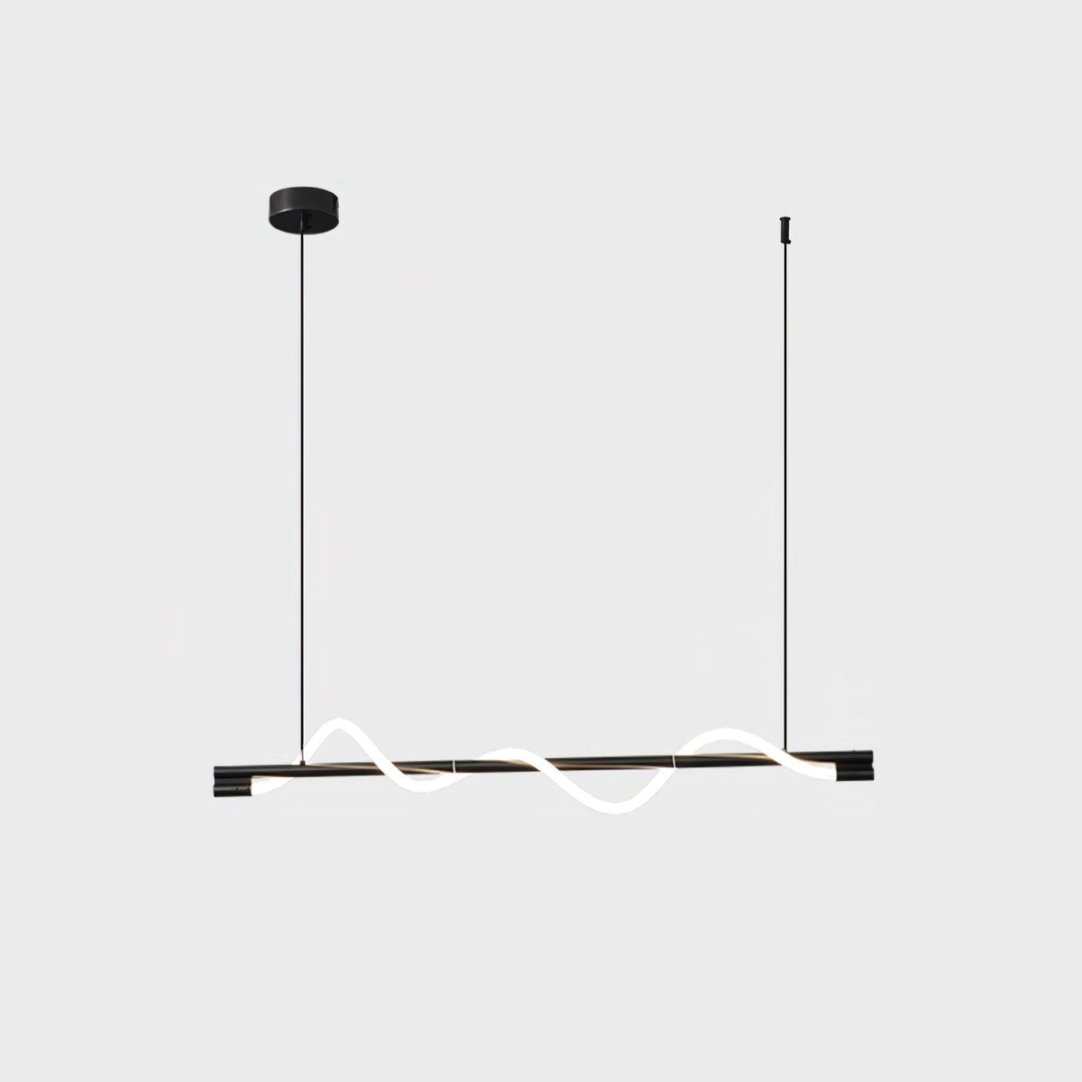 Black Clérachic linear pendant with a low glowing wave on thin black cords, on a light backdrop.